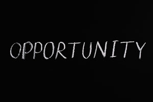 "Life-Changing Opportunity" Written opn Black Chalkboard